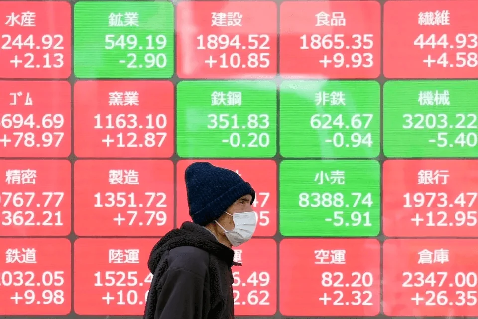 Stock price board where red shows prices going up