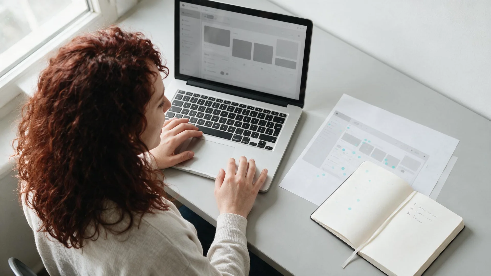 Woman working at a laptop